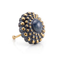 Girándola Pizarra Oro — vista lateral del anillo de porcelana gris azulado con bultos dorados y aro dorado abierto, fondo blanco